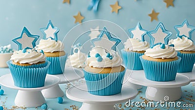 A birthday party with blue cupcakes on a cupcake stand. The cupcakes have white frosting and blue with star stars on top Stock Photo