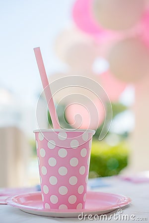 Birthday Party Pink Cup with Polka Dots Stock Photo