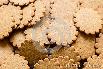 Biscuit background. Brown round cookies texture. Fattening unhealthy concept Stock Photo