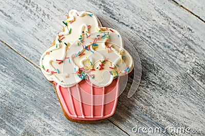 Biscuit shaped as cupcake. Stock Photo