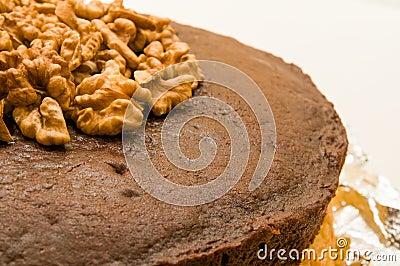 Biscuit and shelled walnuts on top (front view) Stock Photo