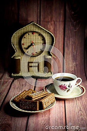 Biscuits and a cup of black coffee are delicious dishes for breakfast to start a beautiful day Stock Photo