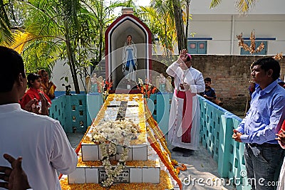 Bishop Shyamal Bose leads prayer at the tomb of Croatian missionary, Jesuit father Ante Gabric in Kumrokhali, West Bengal, India Editorial Stock Photo