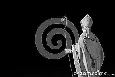 Bishop statue with mitre and crosier B/W Stock Photo