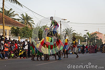 Group of boys performing during the Carnival Celebrations in the city of Bisssau Editorial Stock Photo