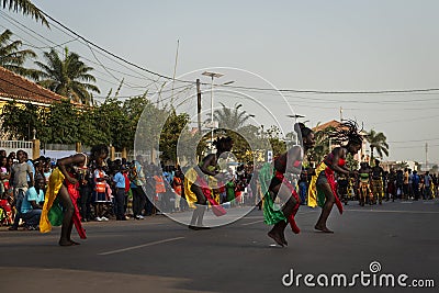 Group of girls performing during the Carnival Celebrations in the city of Bisssau Editorial Stock Photo