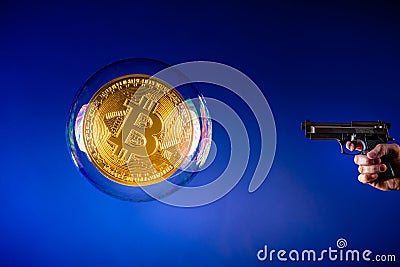 Bitcoin bubble and pistol Stock Photo
