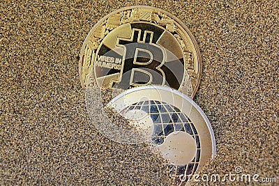 Bitcoin Coin and Ripple Coin Cryptocurrency Editorial Stock Photo