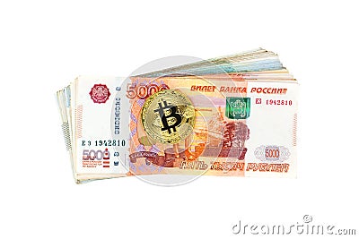 Bitcoin coin and stack of russian banknotes Stock Photo