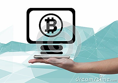 Bitcoin computer icon and hand holding phone Stock Photo