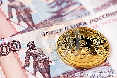 Bitcoin Cryptocurrency with Russian Rubles money. Russia Bitcoin Gold USD Dollar Stock Photo