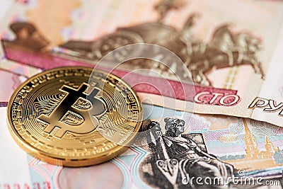 Bitcoin Cryptocurrency with Russian Rubles money. Russia Bitcoin Gold USD Dollar Stock Photo