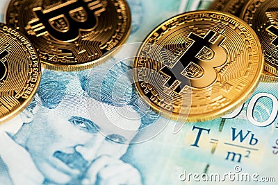 Bitcoin cryptocurrency on Serbian money Dinar banknotes close up image. Portrait of scientist Nikola Tesla. Stock Photo