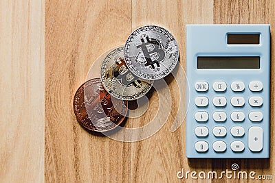 Bitcoin digital cryptocurrency with calculator Stock Photo