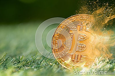 Bitcoin digital cryptocurrency losing value price fall drop breaking down concept. crypto money coin explosion dispersion fade out Stock Photo