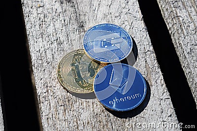 Bitcoin, Ethereum, Dash on the devoted background Editorial Stock Photo