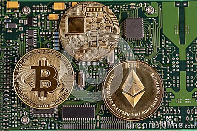 Bitcoin and Ethereum on the printed circuit board.Concept of cry Editorial Stock Photo