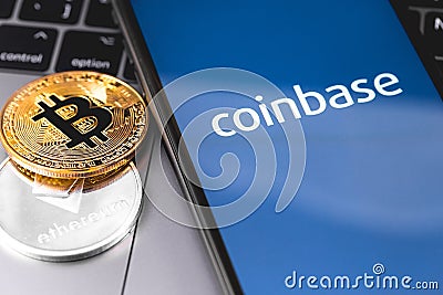 Bitcoin, ethereum and smartphone with Coinbase logo on the screen Editorial Stock Photo