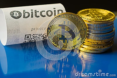 Bitcoin golden coins and paper receipt Stock Photo