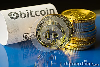 Bitcoin golden coins and paper receipt Stock Photo