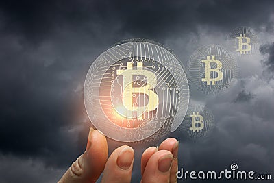 Bitcoin in the hand . Stock Photo