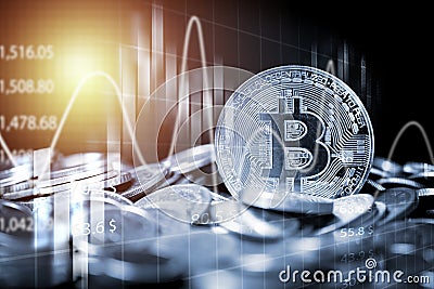 Bitcoin on heap of coins with technical graph and chart, Digital currency exchange and blockchain concept Stock Photo