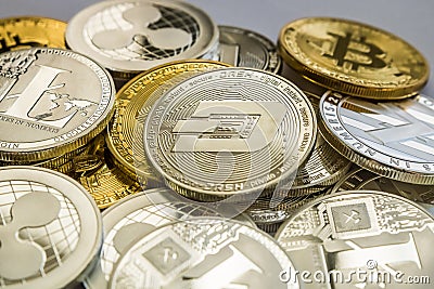 Bitcoin Litecoin Ripple and Dash Cryptocurrency Coins. Editorial Stock Photo