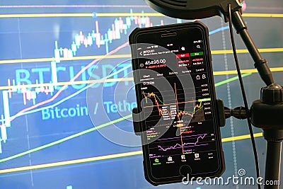 Bitcoin is an open source peer-to-peer electronic cash system that uses blockchain technology Editorial Stock Photo