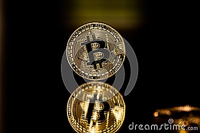Bitcoin reflection on dark background Stock Photo