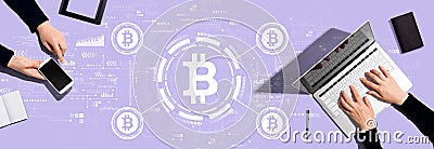 Bitcoin theme with people working together Stock Photo
