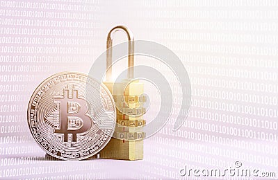 BitcoinBTC coin with padlock lying on white background. Stock Photo