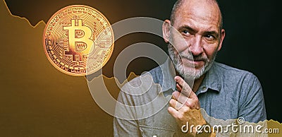 Bitcoins - Bitcoin in hand of a casual businessman wondering what the future is Stock Photo