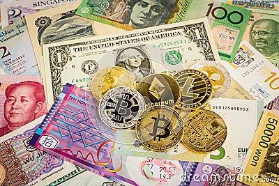 Cryptocurrency coins, electronic money on worldwide banknotes ca Editorial Stock Photo