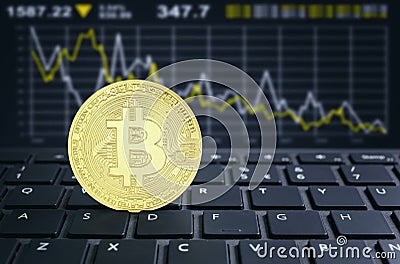 Bitcoins laptop keyboard virtual cryptocurrency concept Stock Photo