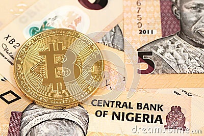 Bitcoins with Nigerian naira close up Stock Photo