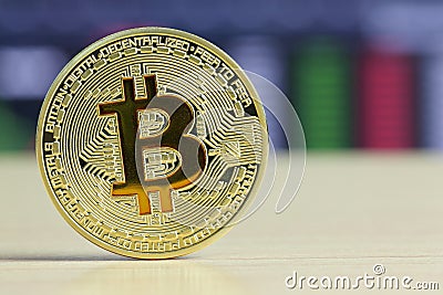Bitcoins placed on a wooden table floor in crypto stock exchange Stock Photo