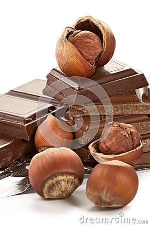 Bitter dark chocolate in a foil and nuts Stock Photo