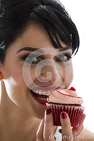 Bitting the muffin Stock Photo