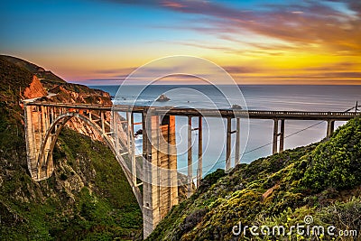 Bixby Bridge and Pacific Coast Highway at sunset Stock Photo
