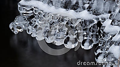 Bizarre icicles with encapsulated air bubbles Stock Photo