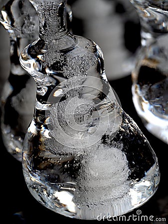 Bizarre icicles with encapsulated air bubbles Stock Photo