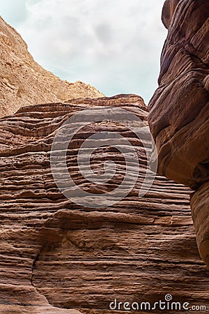 Bizarre patterns of high mountains along the Wadi Numeira hiking trail in Jordan Stock Photo