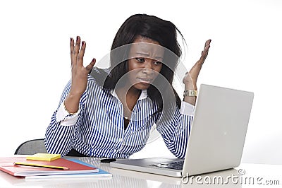 Black African American ethnicity frustrated woman working in stress at office Stock Photo