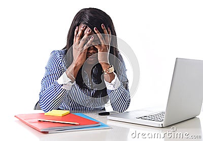 Black African American ethnicity stressed woman suffering depression at work Stock Photo