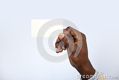 Black African business man holding a business card Stock Photo