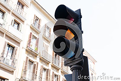 Black amber traffic light on the street Stock Photo