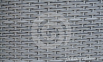 Black artificial rattan pattern. Background of basket structure close-up. Furniture backdrop backdrop Stock Photo