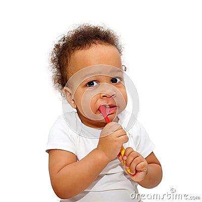 Black baby toddler brushing teeth. Stock Photo