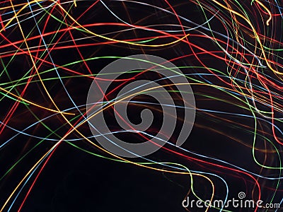 Black background with multicolored luminous lines Stock Photo