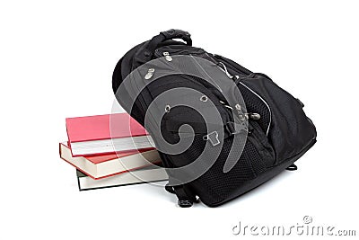 Black backpack with books on white Stock Photo